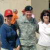 Sandra Tucker and Sandy Vasek pose with Major.